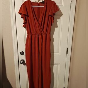 Elegant Rust Jumpsuit with Ruffle Sleeves